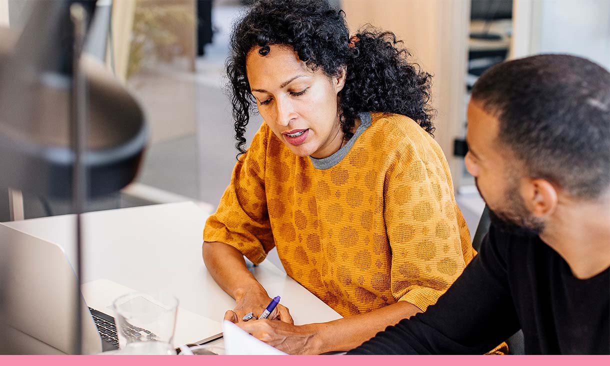 Two coworkers discuss work.