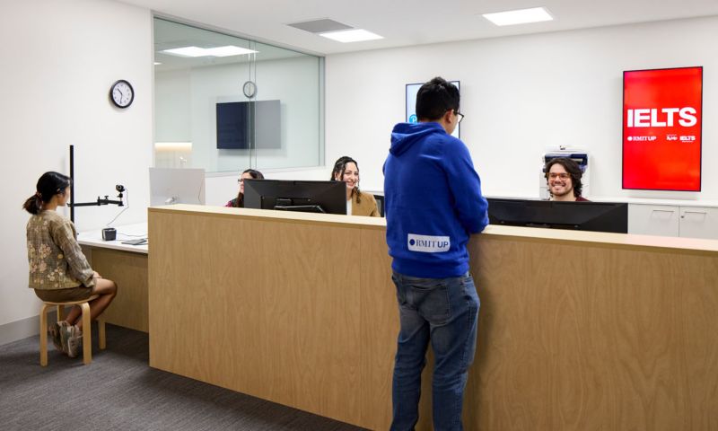 RMIT UP front desk with group of people