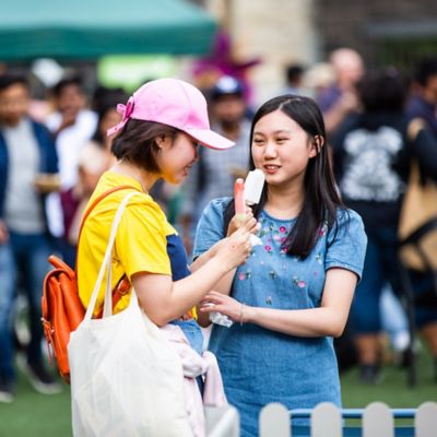 Students eating ice poles